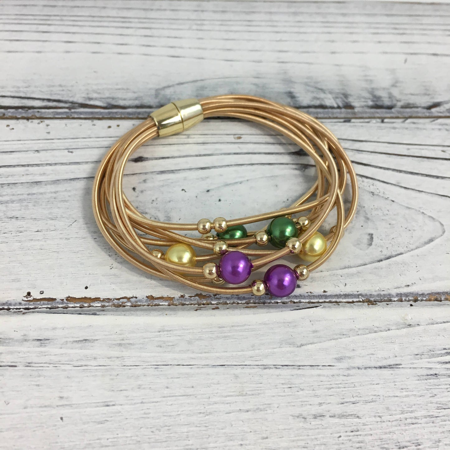 Mardi Gras pearl guitar string bracelet