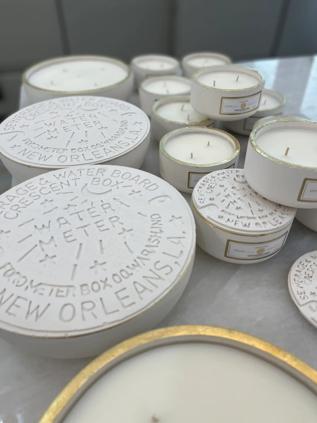 8 oz Reusable Nola Candles w/ Decorative lids * due to delicate nature of this product shipping is not offered. Pick up is offered only.