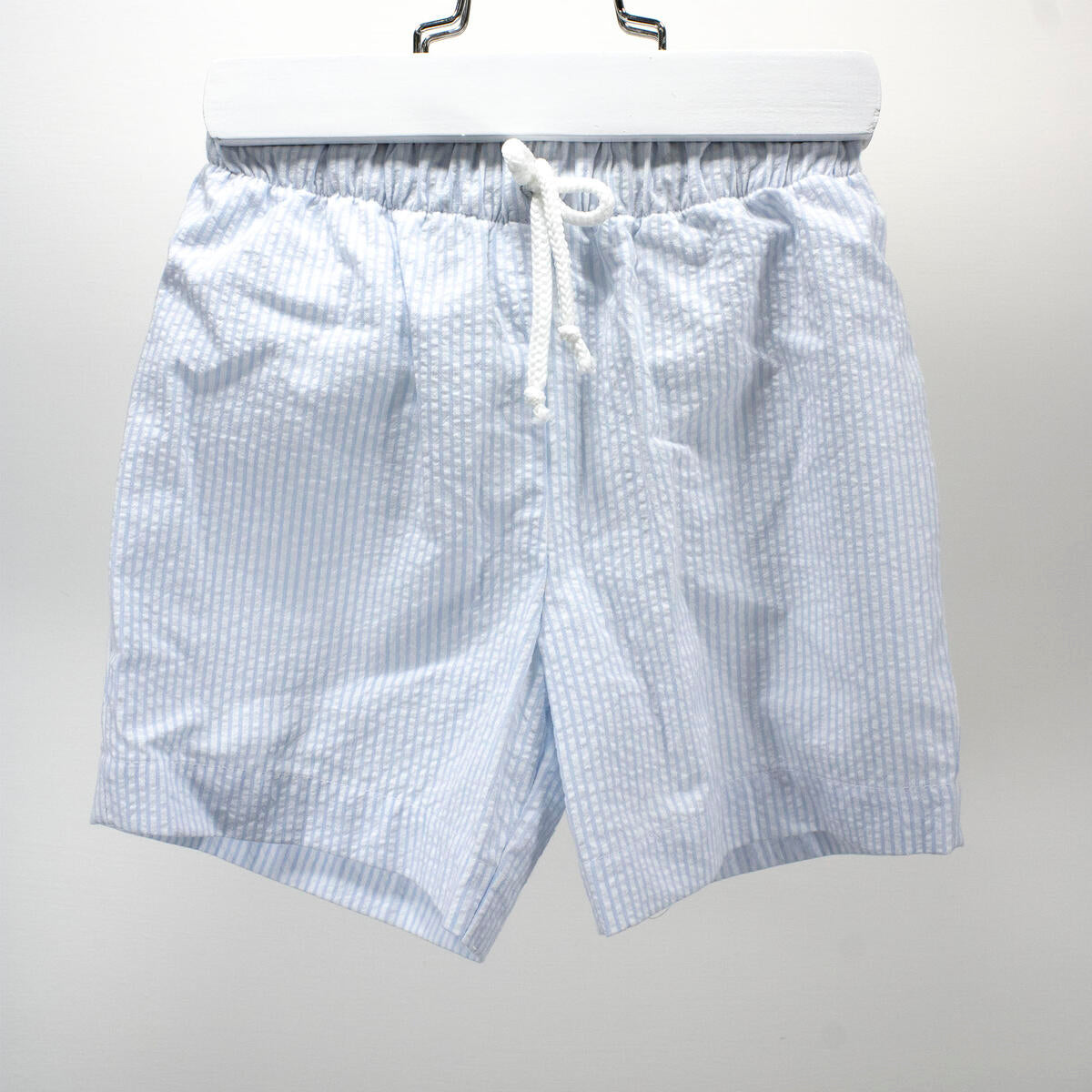 light blue seersucker stripe swim trunks