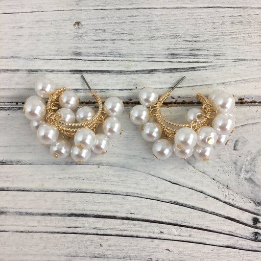 Dangling pearl hoop earrings