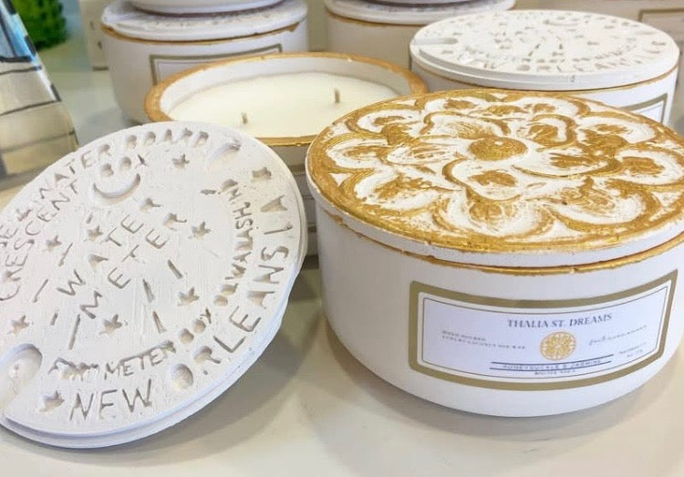 8 oz Reusable Nola Candles w/ Decorative lids * due to delicate nature of this product shipping is not offered. Pick up is offered only.