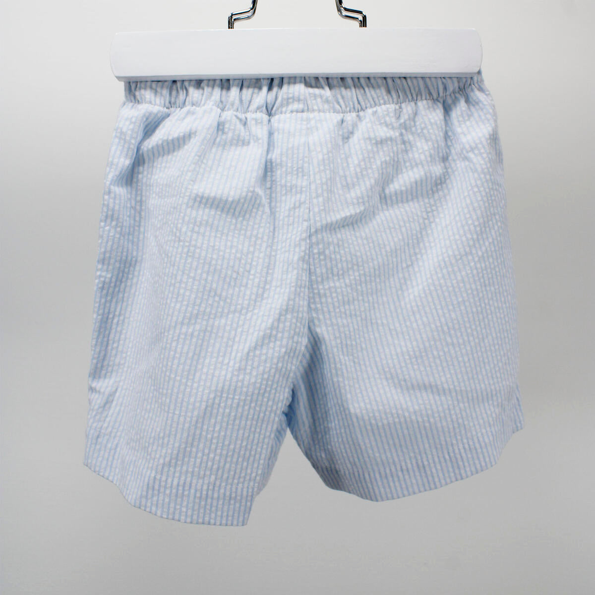 light blue seersucker stripe swim trunks