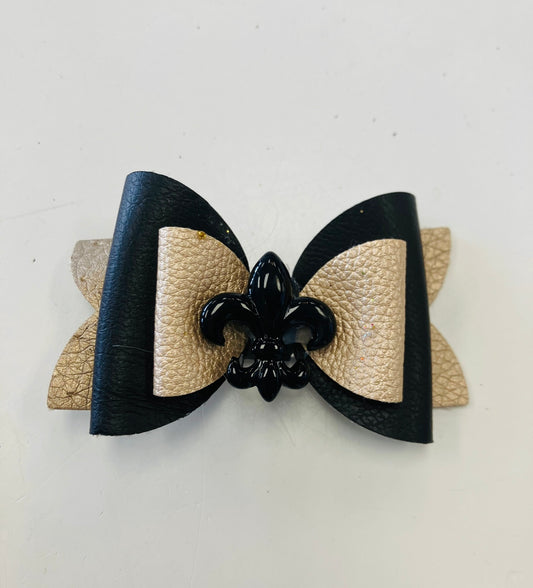 small black and gold bow with black fleur de lis