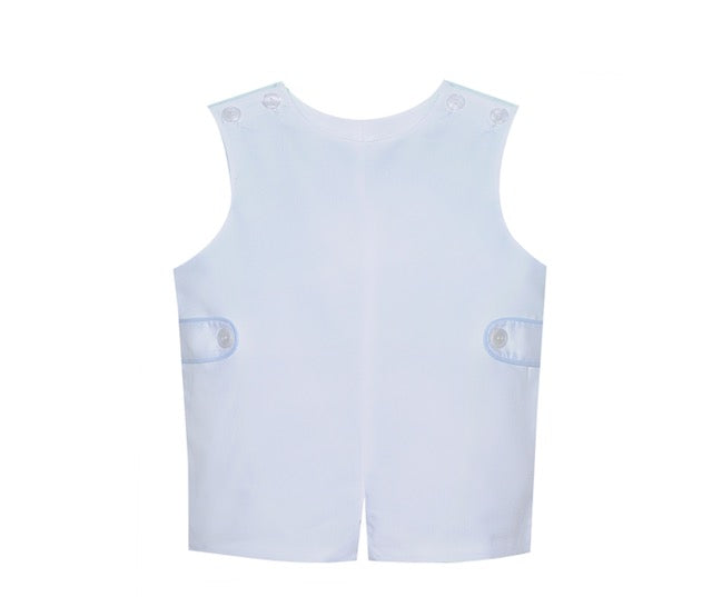 white shortall with blue trim
