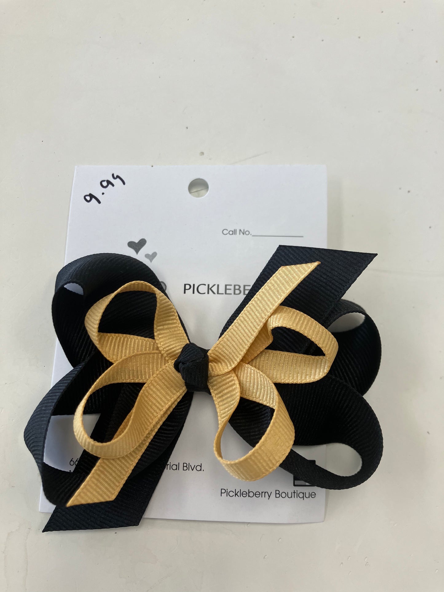 Black and gold bow