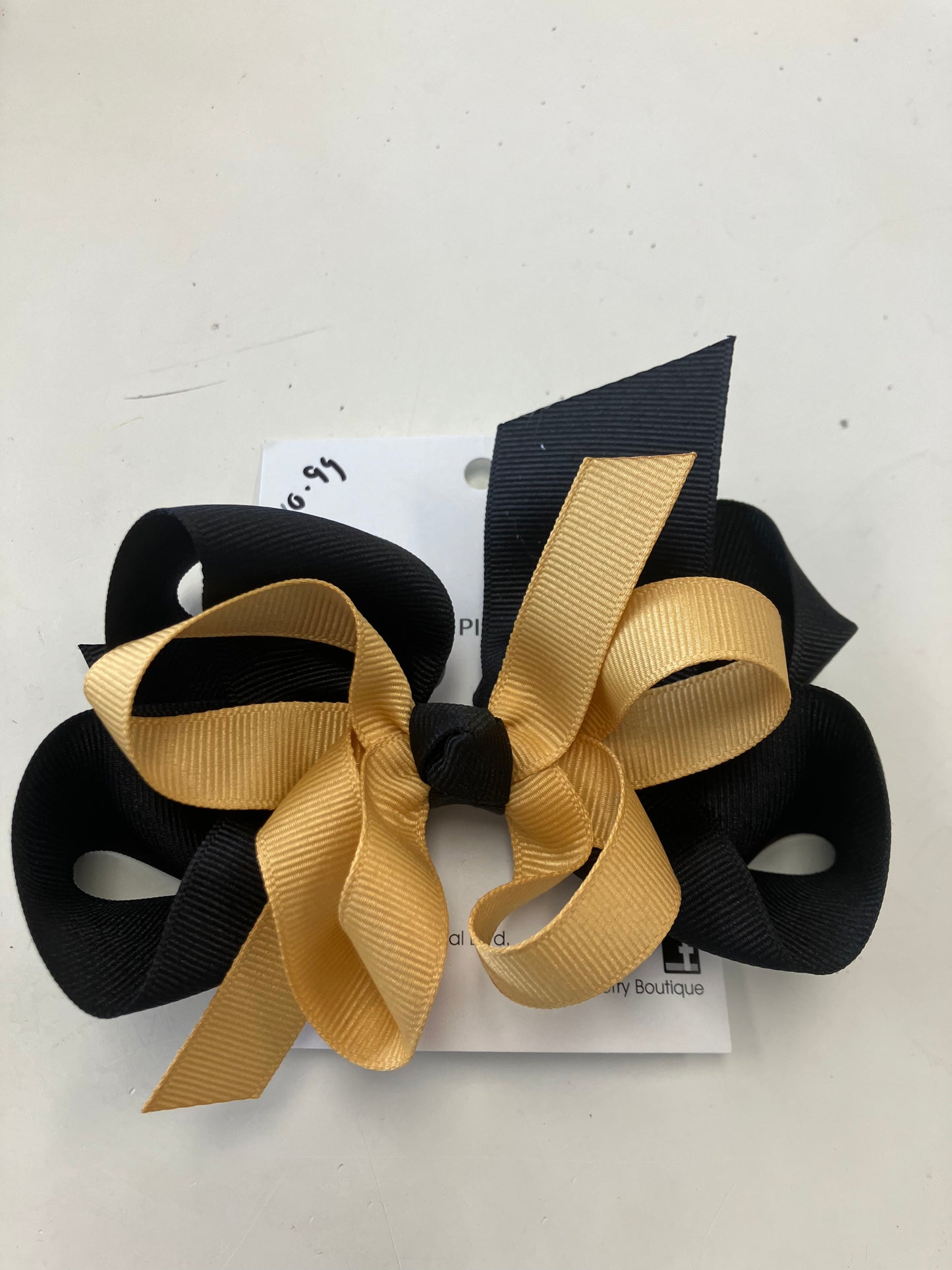 Black and gold bow