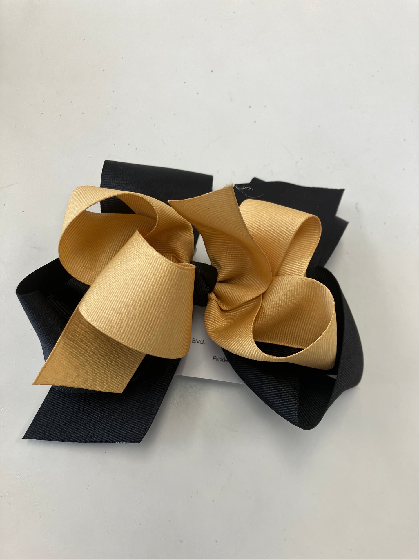 Black and gold bow