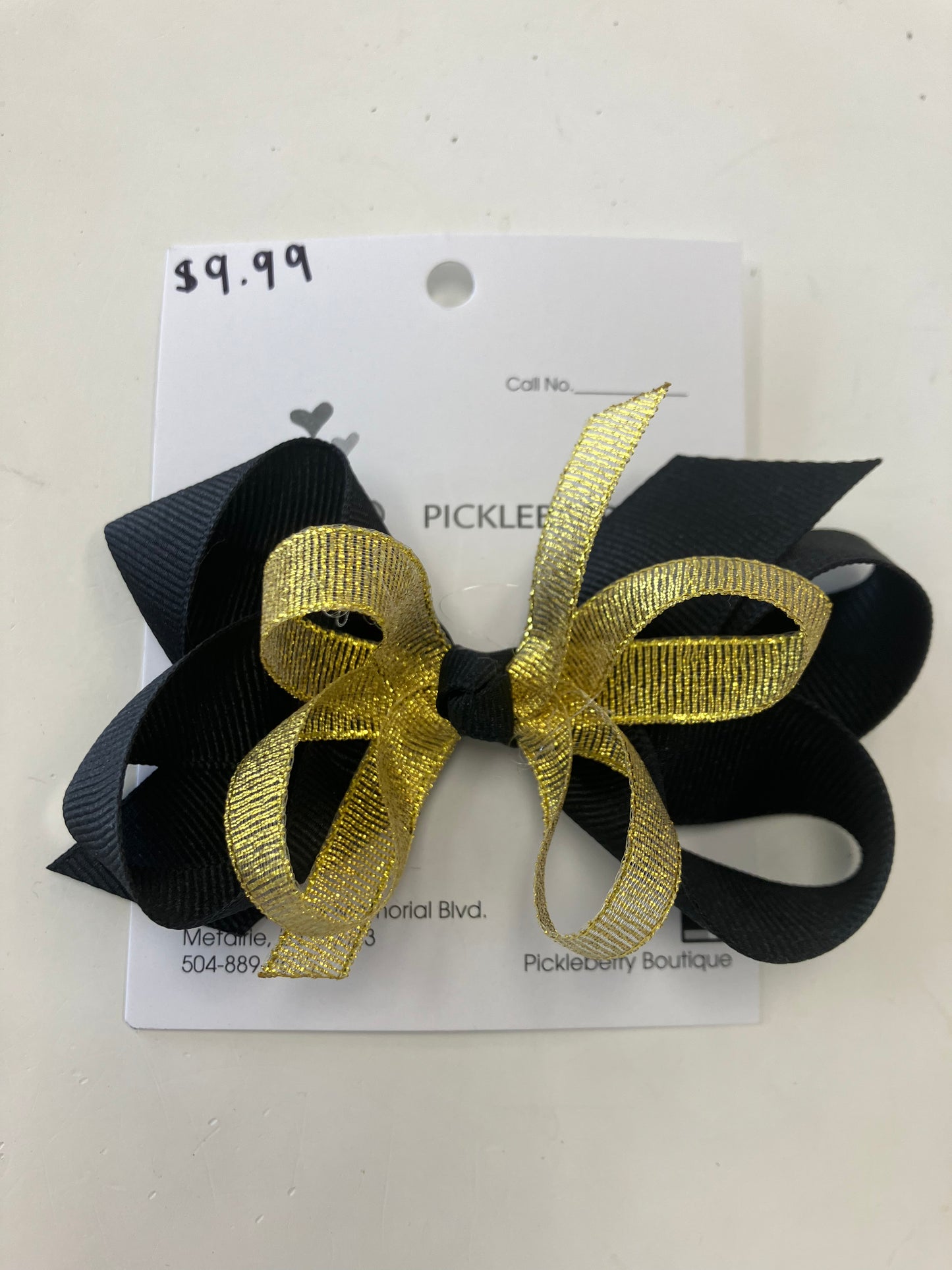 Black and metallic gold bow