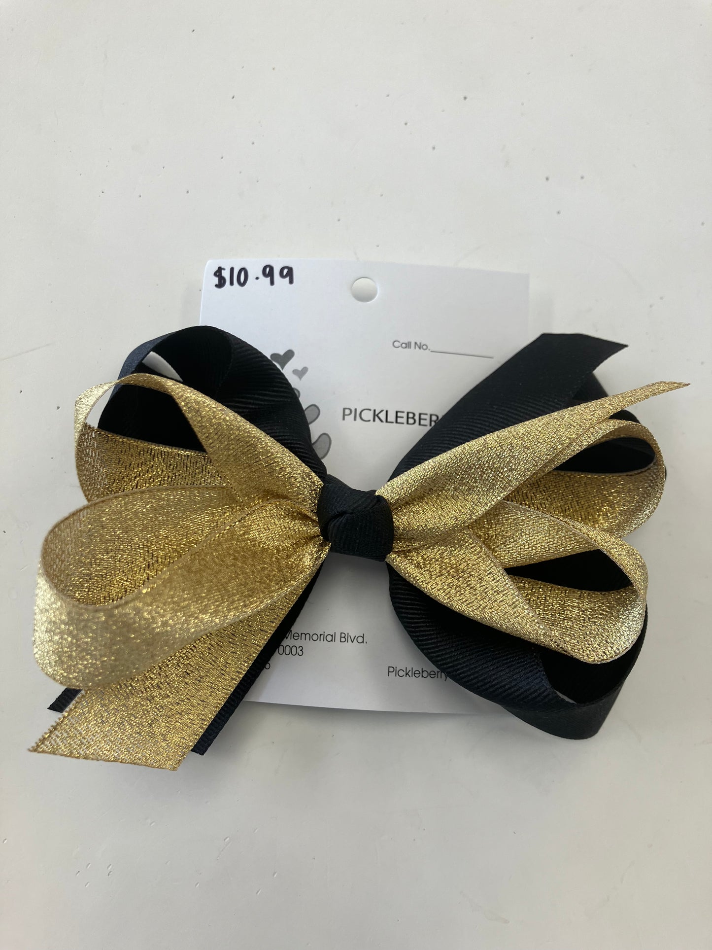 Black and metallic gold bow