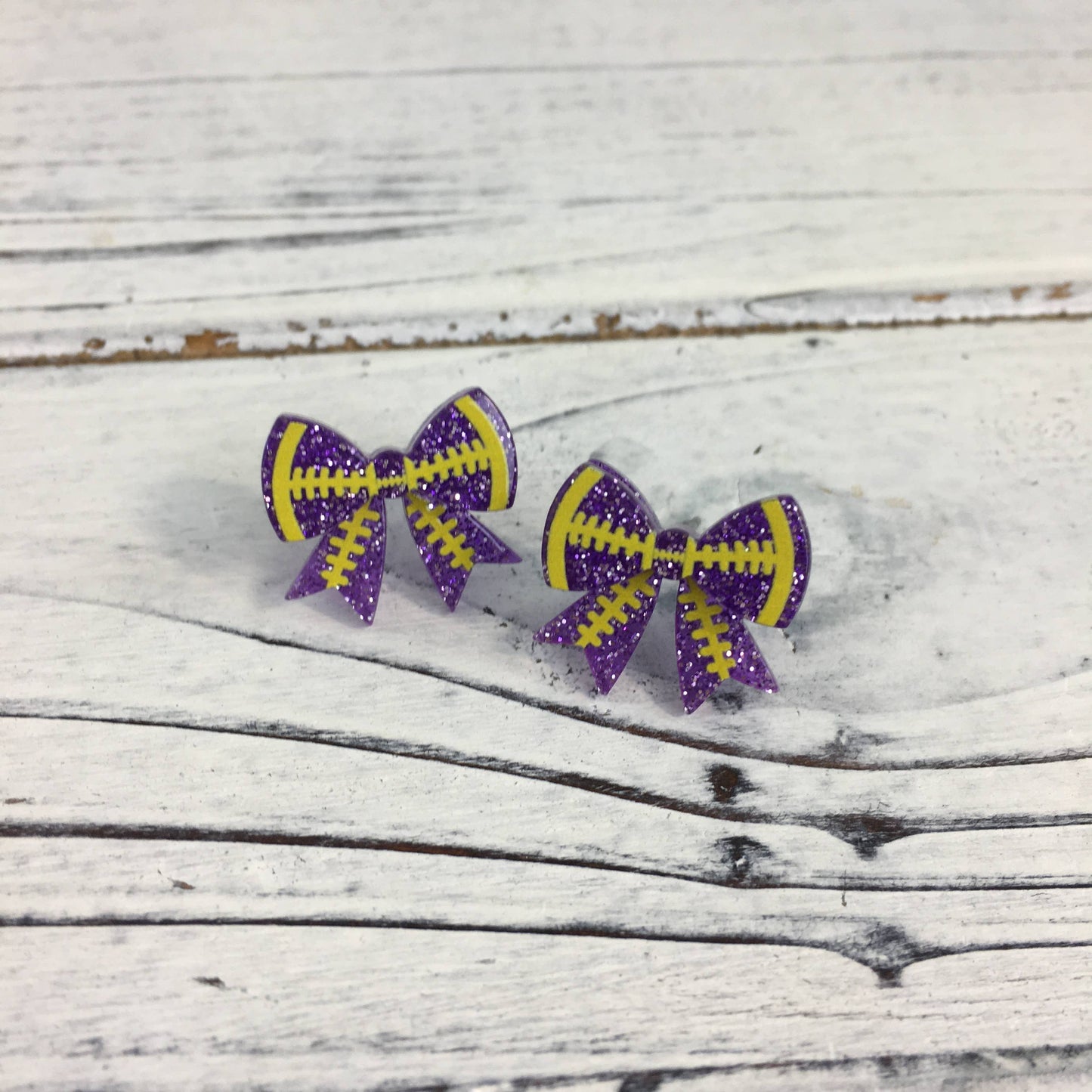 Football bow post earrings PUGD