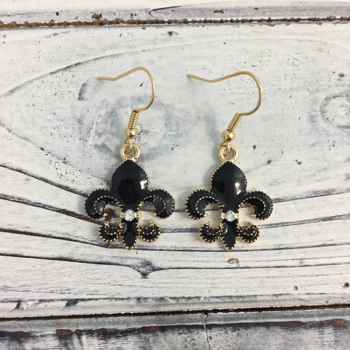 Small fleur de lis earrings